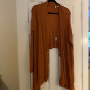 Dusty orange Moth Cardigan from Anthropologie